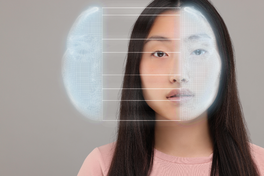 A woman's face being scanned by a biometric mesh — passwordless identity.
